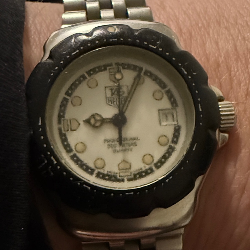 Authentic vintage Tag Heuer Silver and Black Women's Formula 1 Watch